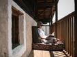 Reading on the balcony