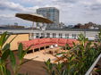 Dachterrasse mit Blick auf Berlin. Hotel The Charming by Curt Suites. Exklusive und zentrale Unterkunft.